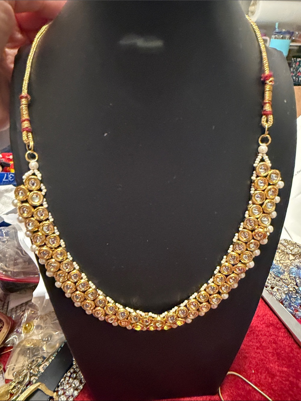 Gold Floral Kundan Necklace with Red Accents - cord slides close size up to 28”